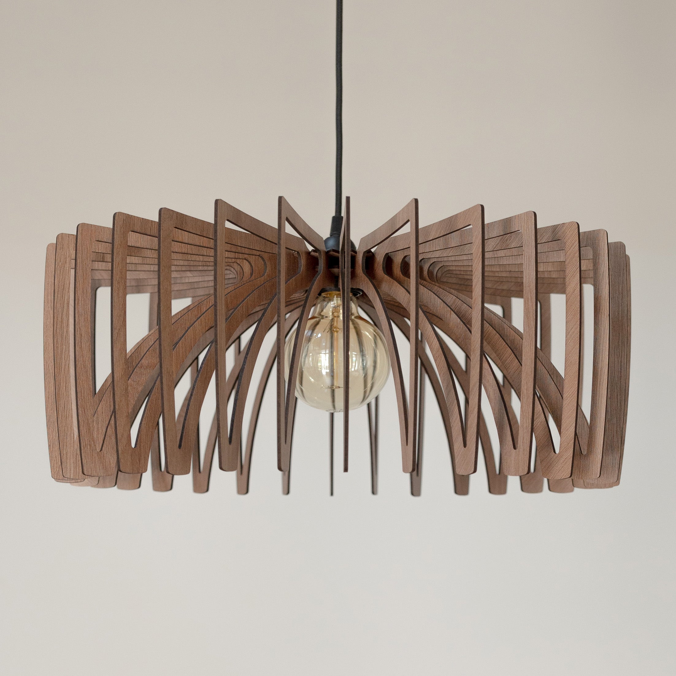 Wooden pendant light with a unique design on a plain background